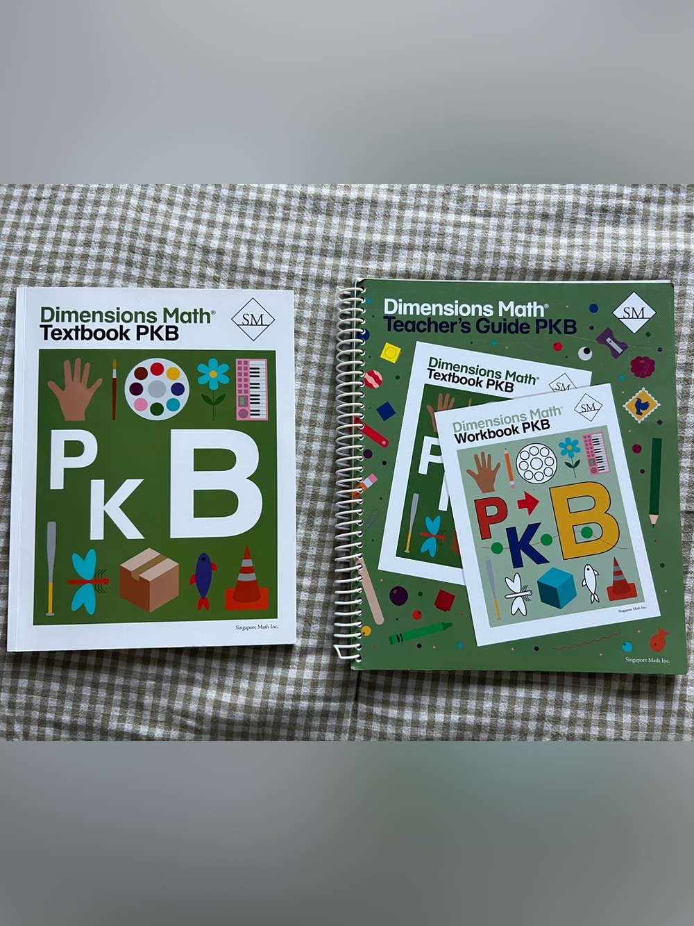 Singapore Math PKB Textbook and Teacher’s Guide, gently used math curriculum.